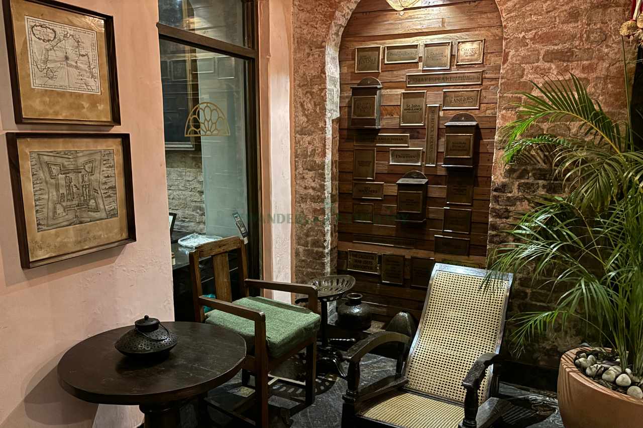 calcutta bungalow Library with vintage couches